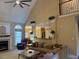 Bright living room featuring a fireplace and ample seating for relaxing and entertaining at 2012 Silverleaf Dr, Youngsville, NC 27596