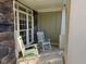 Cozy front porch with rocking chairs, perfect for relaxing and enjoying the outdoors at 2012 Silverleaf Dr, Youngsville, NC 27596