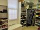 Organized walk-in closet with shelving and storage for shoes, clothes, and accessories at 2012 Silverleaf Dr, Youngsville, NC 27596