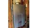 Wall-mounted Rinnai tankless hot water system with natural gas connection at 2012 Silverleaf Dr, Youngsville, NC 27596