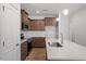 Modern kitchen featuring stainless steel appliances and a central island sink at 255 Chesapeake Commons St # 90, Garner, NC 27529