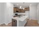Kitchen island with stainless sink and modern appliances at 255 Chesapeake Commons St # 90, Garner, NC 27529