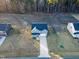 Birds eye view of home with long driveway and landscaping at 316 Robert Howe Dr, Fuquay Varina, NC 27526