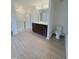 Bright bathroom featuring a double vanity, a glass-enclosed shower, and sleek modern fixtures at 316 Robert Howe Dr, Fuquay Varina, NC 27526