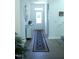 Inviting entryway with a decorated front door, console table, and a long decorative rug at 316 Robert Howe Dr, Fuquay Varina, NC 27526