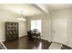 Dining area features hardwood floors, a built-in hutch, and a chandelier at 4204 Vineyard Ridge Dr, Zebulon, NC 27597