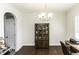 Dining area with hardwood floors, a china cabinet, and a chandelier at 4204 Vineyard Ridge Dr, Zebulon, NC 27597