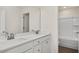 Bathroom boasts double vanity and a shower/tub combo at 432 Old Fashioned Way, Lillington, NC 27546