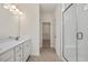 Double vanity bathroom with walk-in shower and separate closet at 432 Old Fashioned Way, Lillington, NC 27546