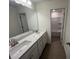 Modern bathroom with double vanity and tub at 432 Old Fashioned Way, Lillington, NC 27546