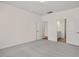 Bright bedroom with grey carpeting and ensuite bathroom access at 432 Old Fashioned Way, Lillington, NC 27546