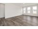 Spacious living room with hardwood floors and lots of natural light at 432 Old Fashioned Way, Lillington, NC 27546