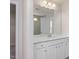 Vanity with a large mirror and access to a walk-in closet at 65 Wild Turkey Way Way, Lillington, NC 27546