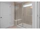 Shower with glass enclosure and built-in bench seat at 65 Wild Turkey Way Way, Lillington, NC 27546