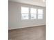 Bright bedroom with hardwood floors and large windows at 65 Wild Turkey Way Way, Lillington, NC 27546