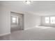 Spacious bonus room with carpet and view into another room at 65 Wild Turkey Way Way, Lillington, NC 27546