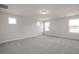 Large bonus room with multiple windows and carpet at 65 Wild Turkey Way Way, Lillington, NC 27546