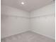 Spacious walk-in closet with wire shelving at 65 Wild Turkey Way Way, Lillington, NC 27546