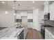 Modern kitchen with granite countertops and stainless steel appliances at 65 Wild Turkey Way Way, Lillington, NC 27546