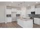 Modern kitchen with granite countertops and stainless steel appliances at 65 Wild Turkey Way Way, Lillington, NC 27546