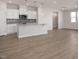 Open concept kitchen with island and hardwood floors at 65 Wild Turkey Way Way, Lillington, NC 27546