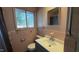 Bathroom with pink tile, vanity, and shower/tub combo at 720 Darby St, Raleigh, NC 27610