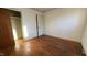 Bedroom with hardwood floors and built-in closet at 720 Darby St, Raleigh, NC 27610