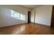 Simple bedroom with hardwood floors and ample closet space at 720 Darby St, Raleigh, NC 27610