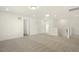 Large bonus room with neutral carpet, providing flexible space for entertainment or relaxation on the upper level at 87 Browning Mill Dr, Wendell, NC 27591