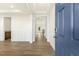 View of entryway featuring beautiful floors, stylish wainscoting, and an open floorplan at 87 Browning Mill Dr, Wendell, NC 27591