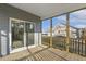 Relaxing screened porch features a wood deck and views of the backyard at 87 Browning Mill Dr, Wendell, NC 27591