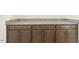 Built-in storage space with granite countertops and modern hardware at 87 Browning Mill Dr, Wendell, NC 27591