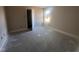 Bright bedroom with ample natural light and closet at 17 Maxwell Farm Ln, Selma, NC 27576