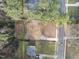 Top-down aerial view of a vacant lot for sale in an established neighborhood setting at 216 Dartmouth Rd, Raleigh, NC 27609