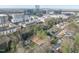 Aerial view of a vacant lot for sale in established neighborhood with nearby cityscape in the distance at 216 Dartmouth Rd, Raleigh, NC 27609