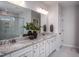 Elegant bathroom with double vanity, granite countertop, and large walk-in shower at 257 Circle City Way, Pittsboro, NC 27312