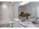 Modern bathroom with double vanity, granite countertop, and bathtub at 257 Circle City Way, Pittsboro, NC 27312