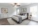 Main bedroom with neutral decor, hardwood floors and plenty of natural light at 43 Olde Place Dr, Zebulon, NC 27597