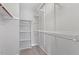 Spacious walk-in closet with shelving for optimal storage and organization opportunities at 14 Stone Village Ct, Durham, NC 27704