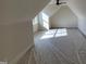 Bright attic space with dormer window, perfect for a bonus room or storage at 20 Water Willow Ln, Zebulon, NC 27597