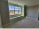 Bright bedroom featuring large window and window seating at 20 Water Willow Ln, Zebulon, NC 27597