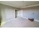 Simple bedroom with neutral walls and hardwood floors at 20 Water Willow Ln, Zebulon, NC 27597