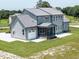 Spacious backyard with a screened porch, and an attached garage on a well maintained lot at 20 Water Willow Ln, Zebulon, NC 27597