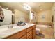 Bathroom featuring double sinks, soaking tub and ample storage at 229 Rose Walk Ln, Carrboro, NC 27510