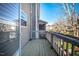 Outdoor deck area featuring wood flooring with views of the surrounding neighborhood at 229 Rose Walk Ln, Carrboro, NC 27510
