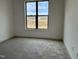 Bedroom with carpet and a view of the pasture at 2401 Terri Creek N Dr # 08, Fuquay Varina, NC 27526