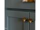 Stylish gray cabinetry with modern gold hardware, enhancing the kitchen's elegance and style at 2401 Terri Creek N Dr # 08, Fuquay Varina, NC 27526