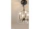 Modern clear glass chandelier with four lights, perfect for a dining area or entryway at 2401 Terri Creek N Dr # 08, Fuquay Varina, NC 27526