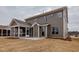 Exterior showcasing the home's neutral siding and a screened in porch at 2401 Terri Creek N Dr # 08, Fuquay Varina, NC 27526