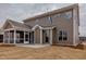 Exterior elevation of the home showing the siding and screened in porch at 2401 Terri Creek N Dr # 08, Fuquay Varina, NC 27526
